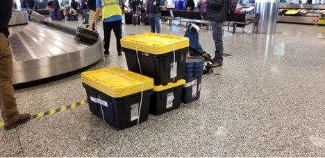 Figure 3.  Totes used as luggage by airline passengers from Cordova to transport goods by air instead of the ferry. Photo by  Jennifer Schmidt