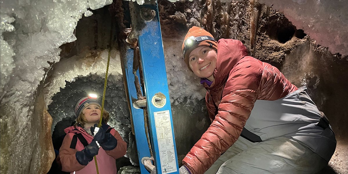 INE researcher Melissa Ward Jones explores the permafrost research cellar.
