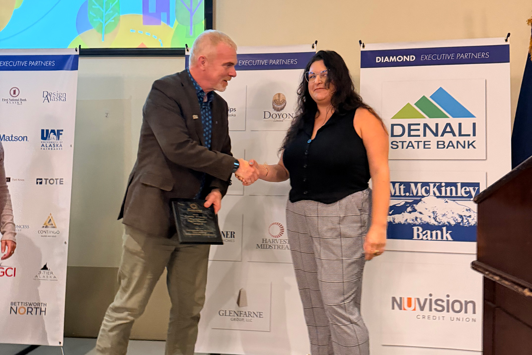 CEM Dean Bill Schnabel accepts the Family Friendly Workplace Award at the Greater Fairbanks Chamber of Commerce Weekly Business Luncheon on August 18th, 2026.